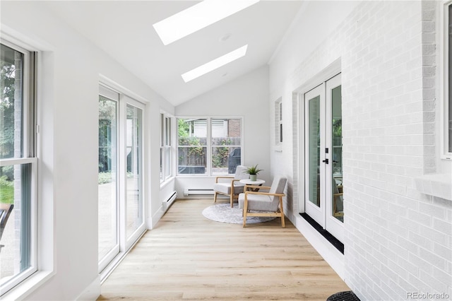3930 S Hillcrest Dr, Denver, CO 80237 - sunroom / solarium featuring french doors, vaulted ceiling, a skylight, a baseboard heating unit, and wood finished floors