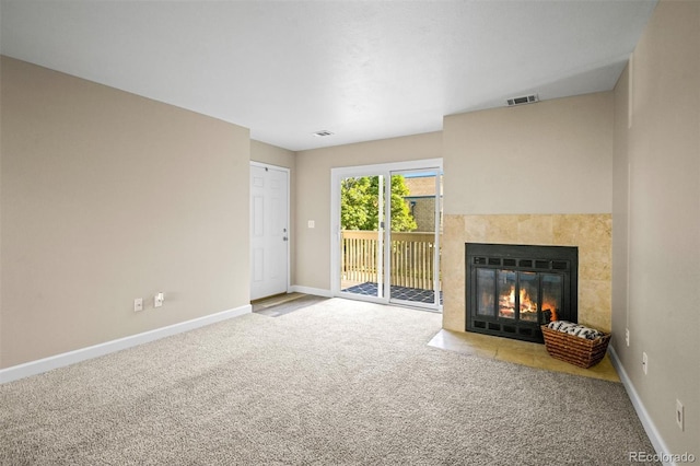 unfurnished living room with carpet floors