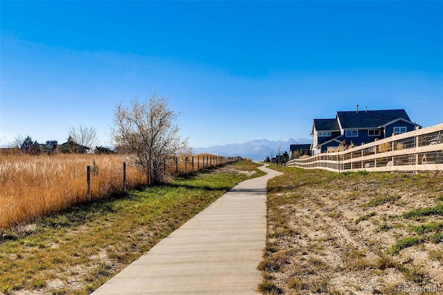 view of home's community featuring a mountain view and a rural view