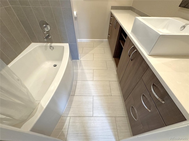 2973 Mesa Rd Unit C, Colorado Springs, CO 80904 - full bath with vanity, a tub to relax in, and tile patterned flooring