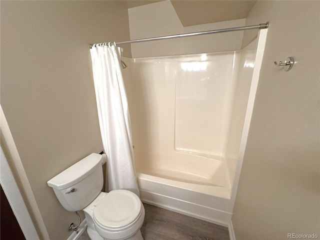 2973 Mesa Rd Unit C, Colorado Springs, CO 80904 - bathroom with wood finished floors and shower / tub combo