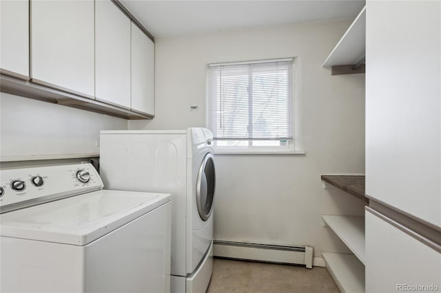 clothes washing area featuring light carpet, separate washer and dryer, a baseboard radiator, and cabinet space