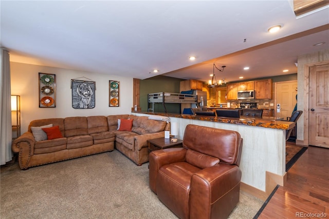 96 Mountainside Dr Unit C102, Granby, CO 80446 - living area featuring recessed lighting, a chandelier, and wood finished floors