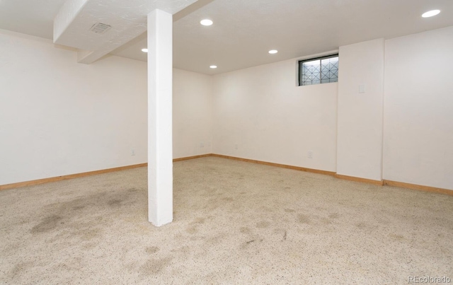 basement with light carpet