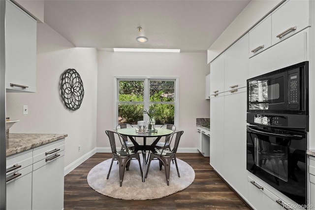 4219 Morning Star Dr, Castle Rock, CO 80108 - dining room with dark wood-style flooring and baseboards