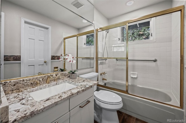 4219 Morning Star Dr, Castle Rock, CO 80108 - full bath featuring vanity, wood finished floors, enclosed tub / shower combo, and healthy amount of natural light