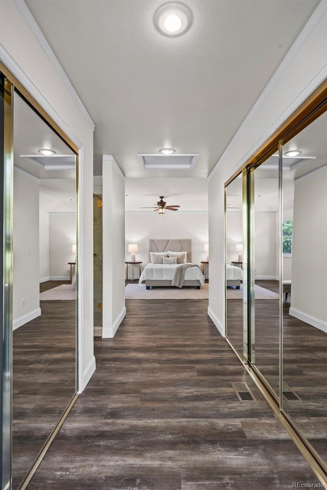 4219 Morning Star Dr, Castle Rock, CO 80108 - corridor featuring wood finished floors and attic access
