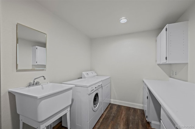 4219 Morning Star Dr, Castle Rock, CO 80108 - laundry room with cabinet space, washing machine and clothes dryer, dark wood finished floors, and recessed lighting