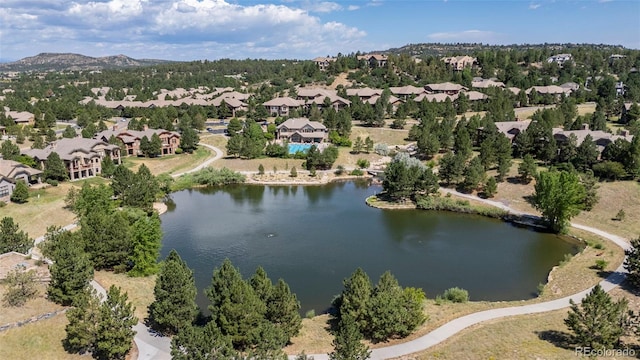 4219 Morning Star Dr, Castle Rock, CO 80108 - aerial perspective of suburban area featuring a nearby body of water
