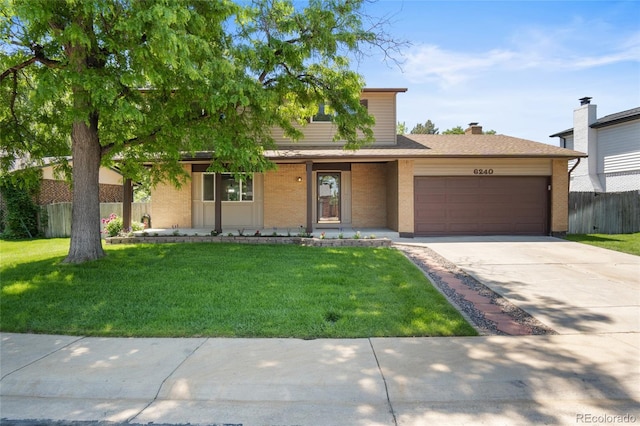 6240 W 110th Pl, Westminster, CO 80020 - view of front of property featuring an attached garage, driveway, and a porch
