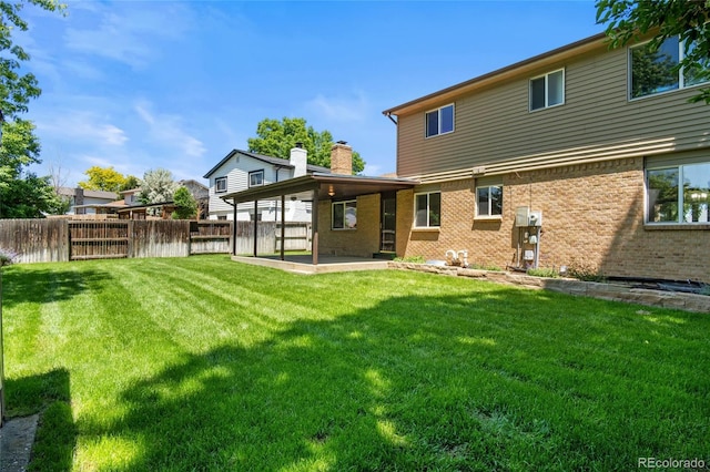 6240 W 110th Pl, Westminster, CO 80020 - rear view of house featuring a patio area and brick siding