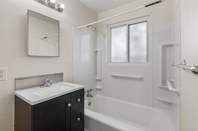 bathroom with vanity and shower / bathing tub combination