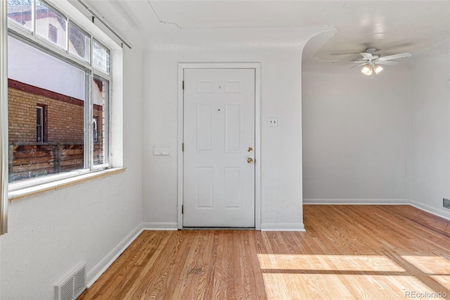 entrance foyer featuring light hardwood / wood-style flooring and ceiling fan