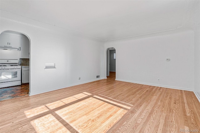 unfurnished living room featuring light wood-type flooring