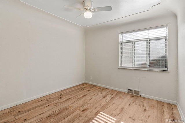 unfurnished room featuring ceiling fan and light wood-type flooring