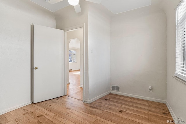 unfurnished bedroom featuring ceiling fan and light hardwood / wood-style floors