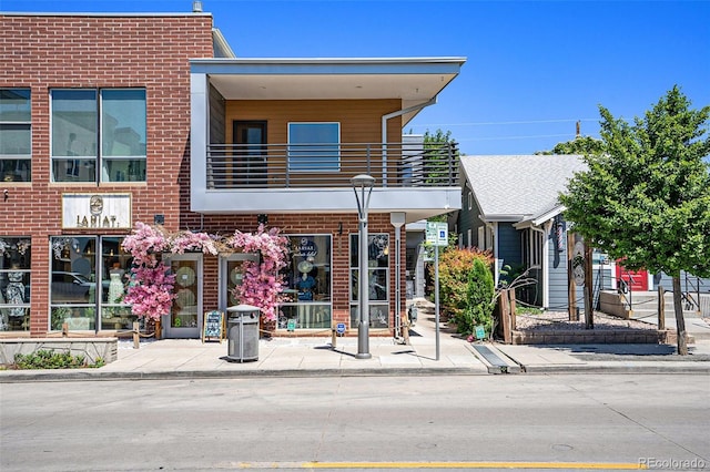 4258 Tennyson St Unit 101, Denver, CO 80212 - view of front of house with a balcony and brick siding