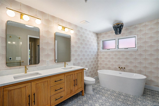 4258 Tennyson St Unit 101, Denver, CO 80212 - full bathroom with a soaking tub, double vanity, and wallpapered walls