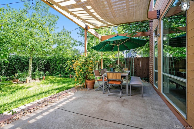 4258 Tennyson St Unit 101, Denver, CO 80212 - fenced backyard featuring outdoor dining space, a pergola, and a patio area