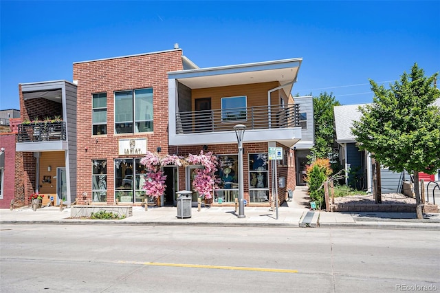 4258 Tennyson St Unit 101, Denver, CO 80212 - view of front of house with a balcony and brick siding