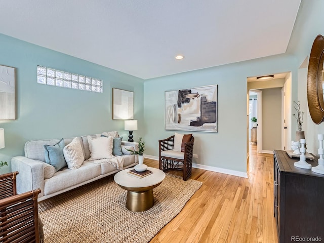 living room with light hardwood / wood-style floors