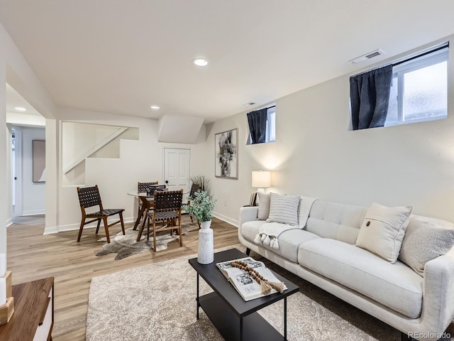 living room with wood-type flooring