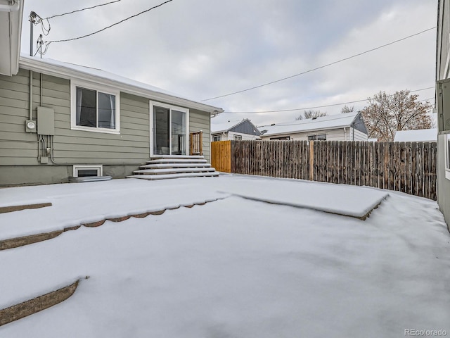 view of snow covered patio