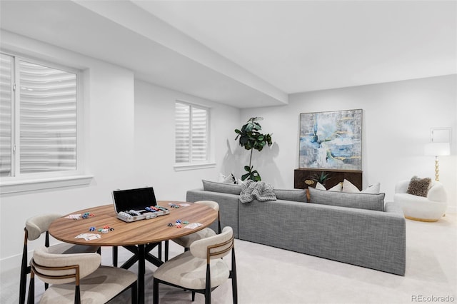 dining space featuring carpet