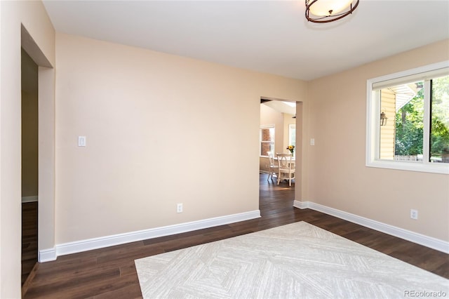 8160 W Phillips Ave, Littleton, CO 80128 - empty room featuring dark wood-style floors