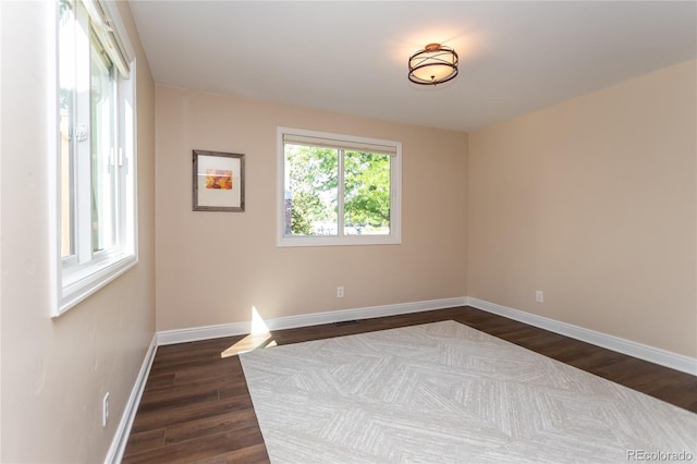 8160 W Phillips Ave, Littleton, CO 80128 - empty room featuring dark wood-type flooring