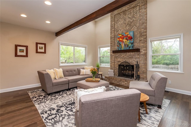 8160 W Phillips Ave, Littleton, CO 80128 - living room featuring beamed ceiling, dark wood finished floors, recessed lighting, a brick fireplace, and high vaulted ceiling
