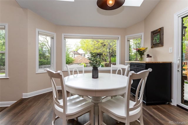 8160 W Phillips Ave, Littleton, CO 80128 - dining area with dark wood-style flooring and baseboards