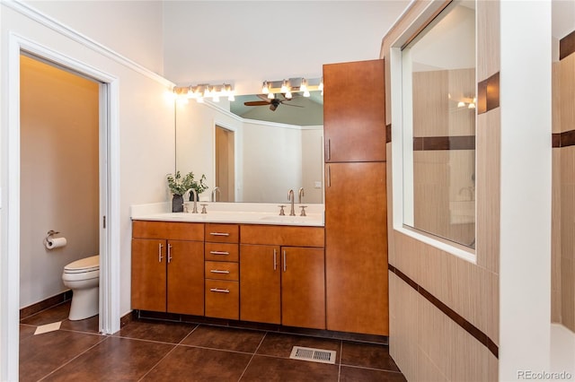 8160 W Phillips Ave, Littleton, CO 80128 - bathroom with double vanity, a ceiling fan, and tile patterned flooring