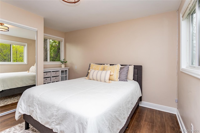 8160 W Phillips Ave, Littleton, CO 80128 - bedroom featuring wood finished floors and baseboards