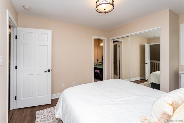 8160 W Phillips Ave, Littleton, CO 80128 - bedroom featuring dark wood-type flooring and a closet