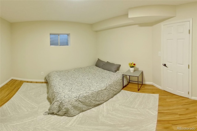 8160 W Phillips Ave, Littleton, CO 80128 - bedroom with wood finished floors and baseboards