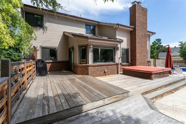 8160 W Phillips Ave, Littleton, CO 80128 - deck featuring a covered hot tub and grilling area