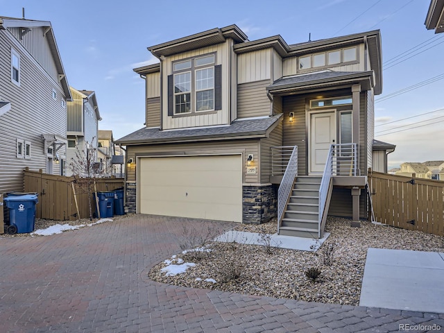 view of front of property featuring a garage