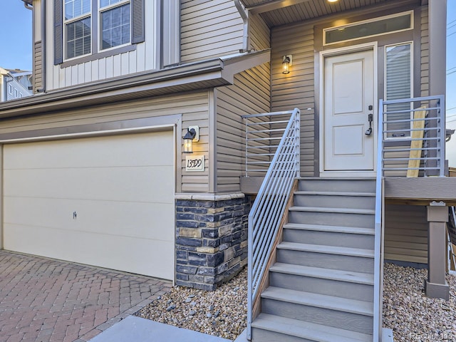 entrance to property featuring a garage