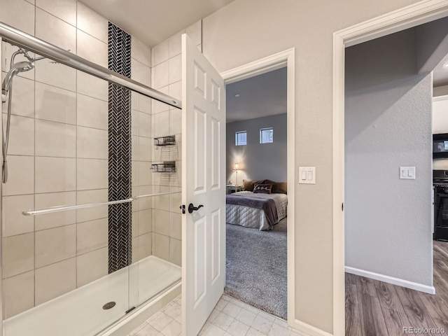 bathroom featuring an enclosed shower