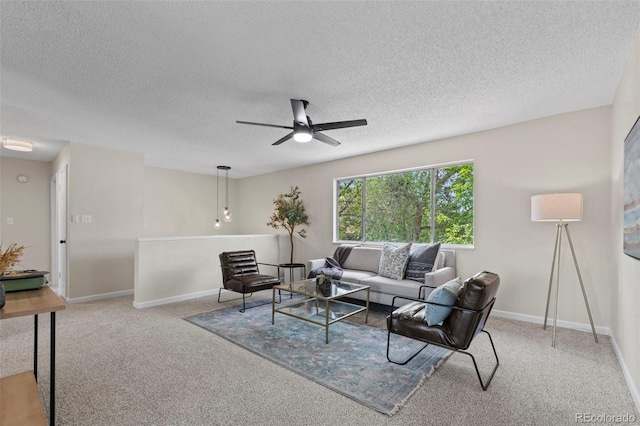 818 Don Juan Ct, Colorado Springs, CO 80909 - carpeted living area with ceiling fan, a textured ceiling, and baseboards