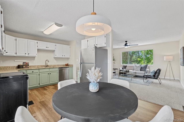 818 Don Juan Ct, Colorado Springs, CO 80909 - dining area featuring ceiling fan and light wood-type flooring