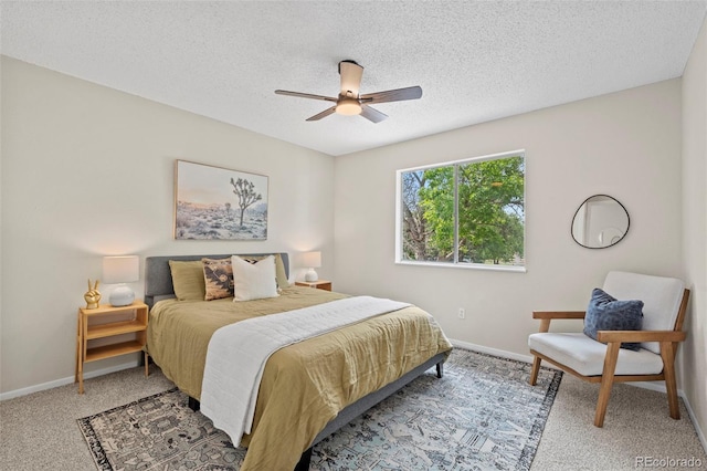 818 Don Juan Ct, Colorado Springs, CO 80909 - carpeted bedroom featuring a textured ceiling, baseboards, and ceiling fan