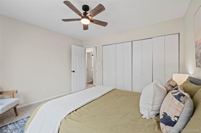 818 Don Juan Ct, Colorado Springs, CO 80909 - bedroom with light carpet, a closet, a ceiling fan, and baseboards