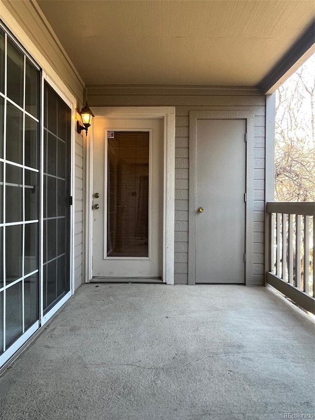 doorway to property featuring a balcony