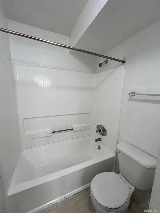 bathroom featuring toilet and shower / washtub combination