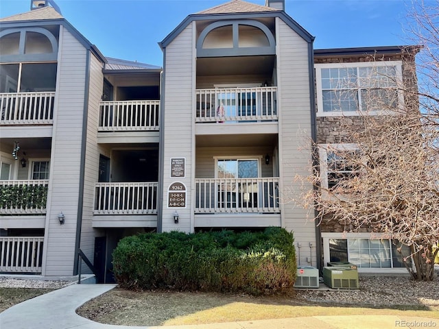 9262 E Arbor Cir Unit H, Englewood, CO 80111 - view of building exterior with central AC unit