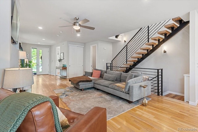 2420 S Gilpin St, Denver, CO 80210 - living room with wood finished floors, a ceiling fan, recessed lighting, and stairway