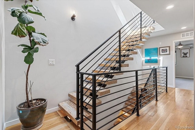 2420 S Gilpin St, Denver, CO 80210 - stairs with wood finished floors and recessed lighting