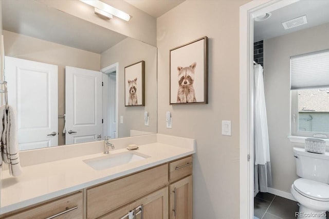 2420 S Gilpin St, Denver, CO 80210 - full bath with vanity and tile patterned floors